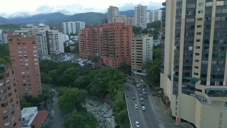 Aerial-View-Over-Cali-River-And-Colombia-Avenue-at-Sunset