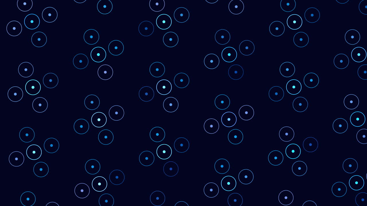 Black and blue circles create an intriguing overlapping pattern on dark background