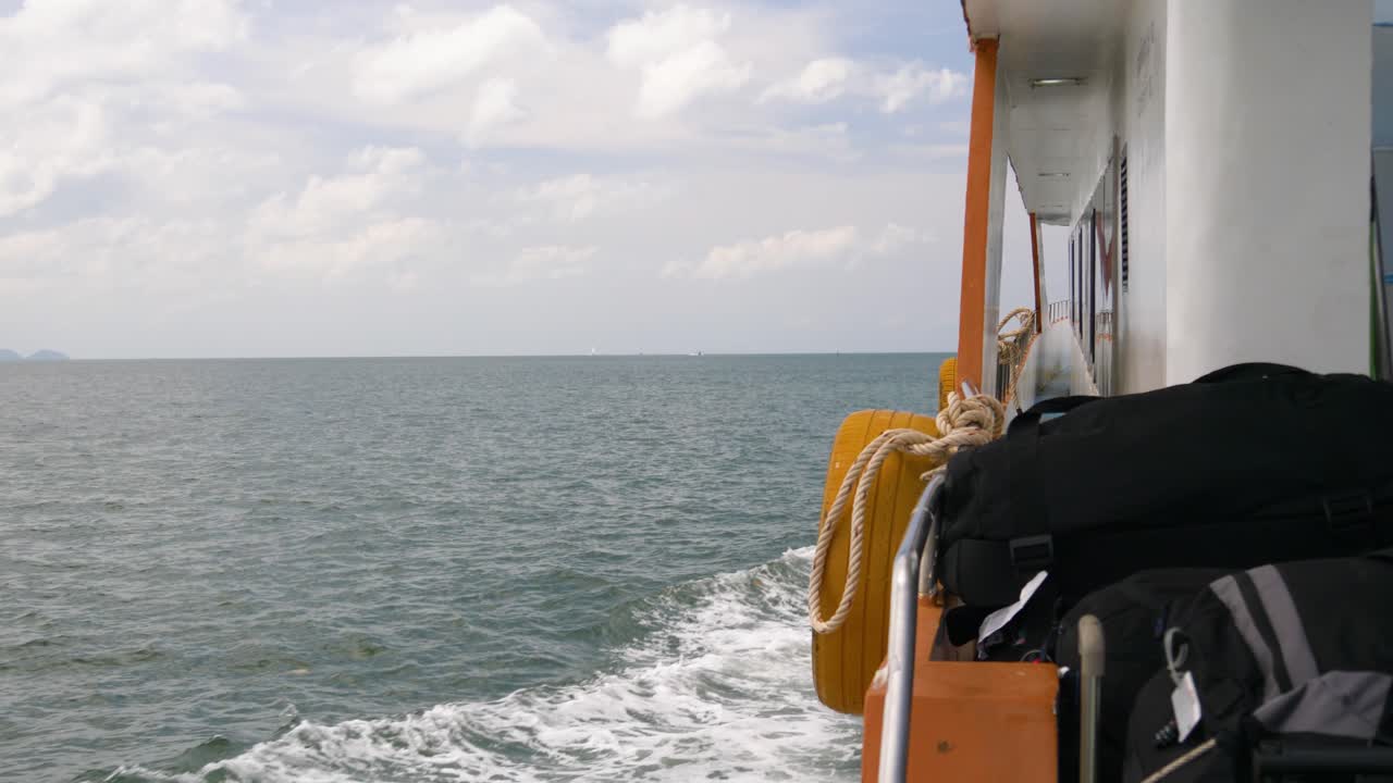 Ferry traveling from Krabi Town port to Kho Phi Phi Island in Thailand, with scenic views of the ocean