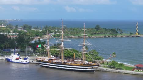 Aerial-old-Italian-navy-ship-Amerigo-Vespucci,-port-in-the-Dominican-Republic