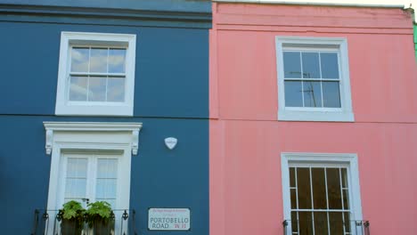 Colorful-Walls-Of-Houses-In-Notting-Hill,-London,-UK---panning