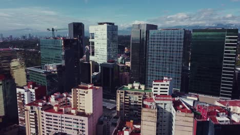 Dolly-panoramic-of-some-business-buildings-on-Polanco-neighborhood-on-a-sunny-morning-in-Mexico-City