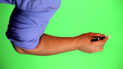 an arm in front of a green screen to be keyed and used at will