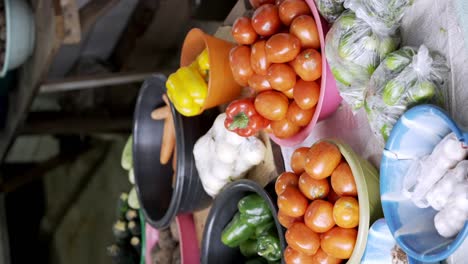 vertical view of fresh fruits and vegetables selling in the african market