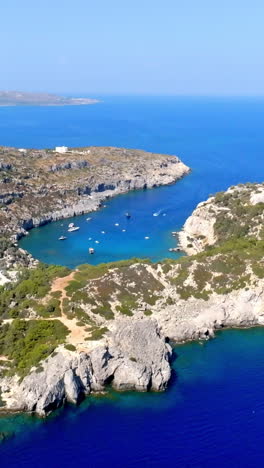 aerial portrait overlooking the anthony quinn bay, sunny day in rhodes, greece