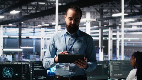 man briefing investors on server room machine learning hardware