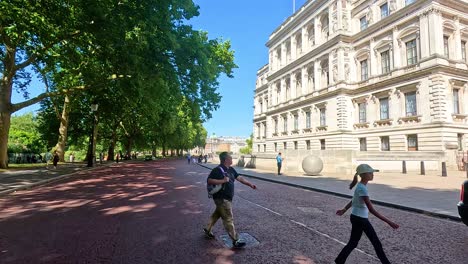 people walking near historic building in london