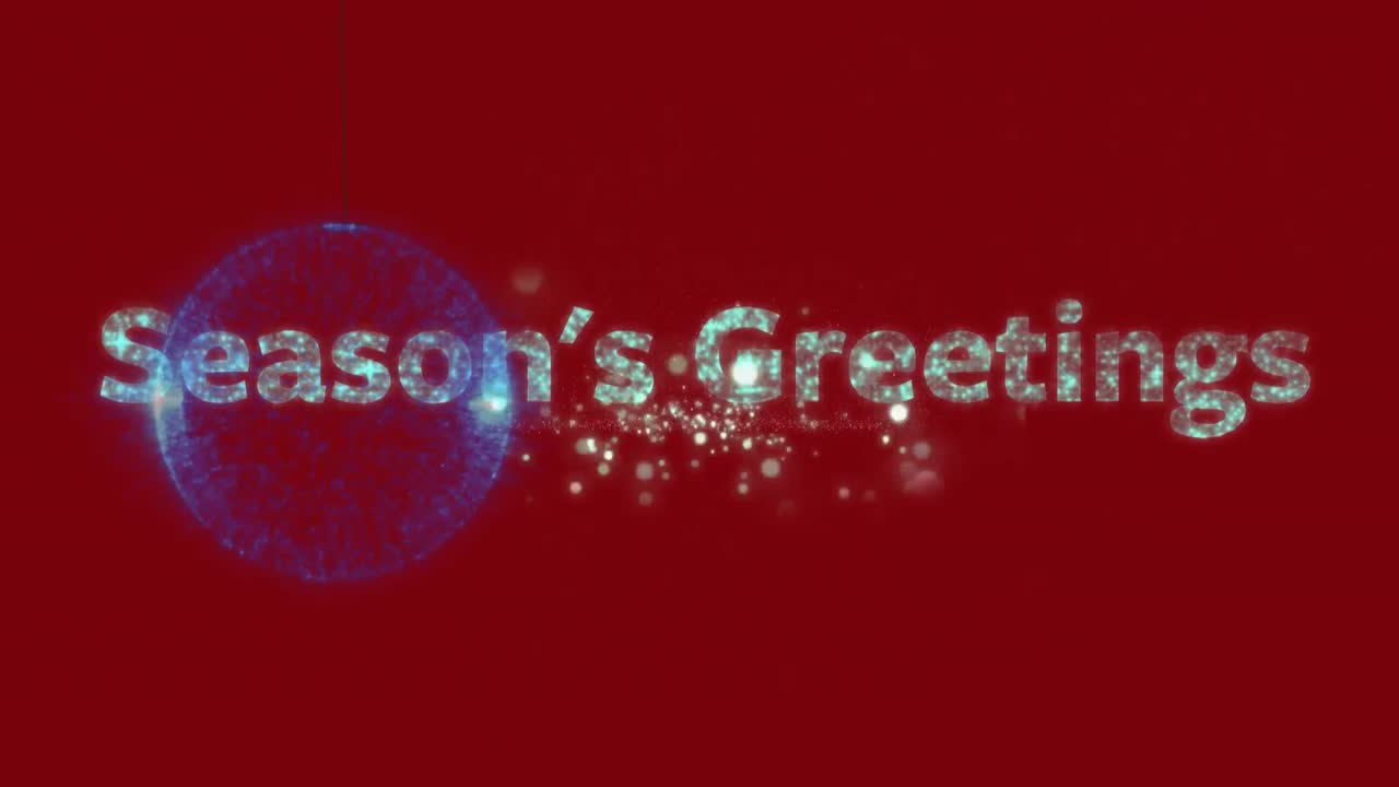 Season's greetings text and hanging blue bauble against fireworks exploding on red background