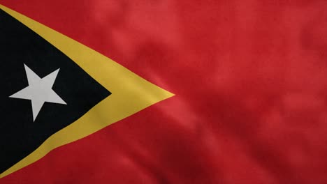 national flag of east timor blowing in the wind. seamless loop