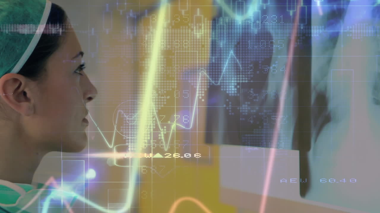 un cirujano está mirando rayos x en un hospital