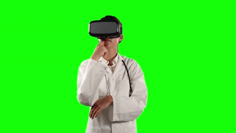 Front-view-of-female-doctor-using-virtual-reality-with-green-screen