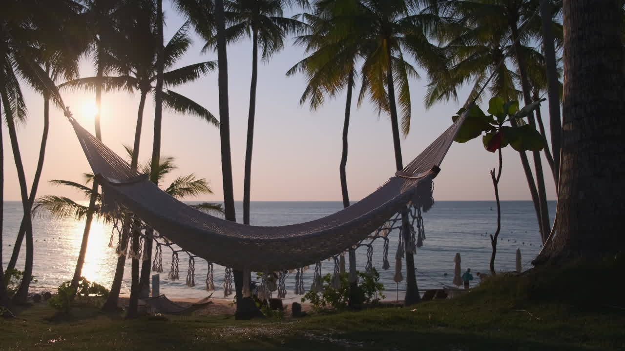 puesta de sol playa hamaca relajación