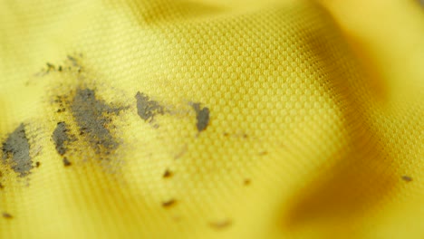 close-up of dirty yellow fabric