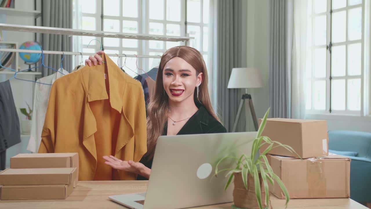 Young Asian Transgender Woman Selling Clothes Online By Live Streaming. Selling It Online Live Streaming Concept