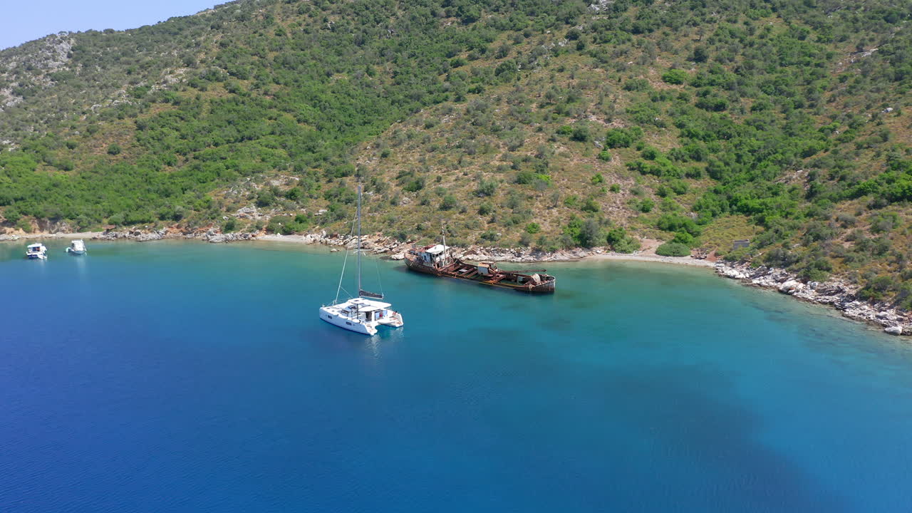 Aerial: Beautiful Alonnisos shipwreck on Peristera island, Sporades, Greece during summer