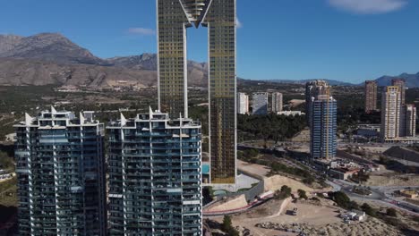 Drone-flight-to-the-tallest-skyscraper-in-the-city-of-Benidorm-called-Intempo,-the-tallest-residential-complex-in-Europe