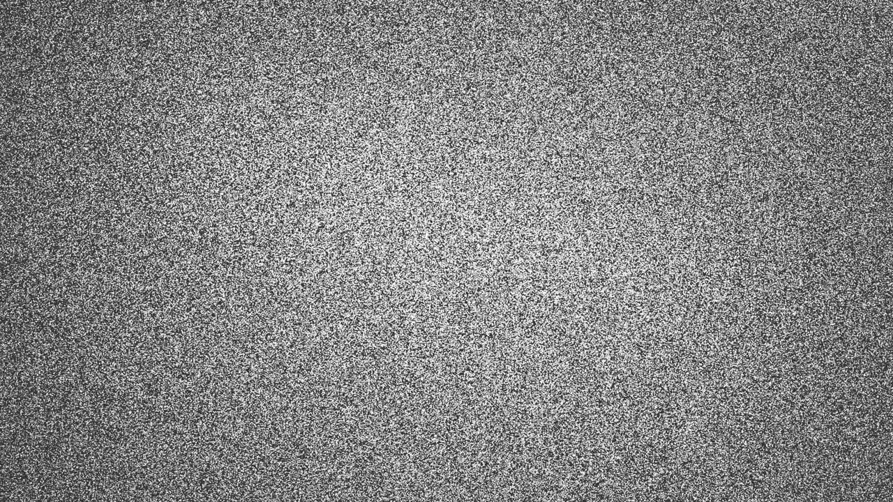 Rumore statico sfarfallante di televisione in bianco e nero