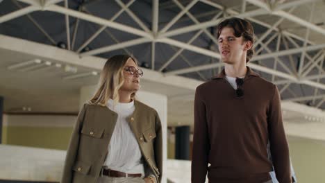 couple walking in a modern building