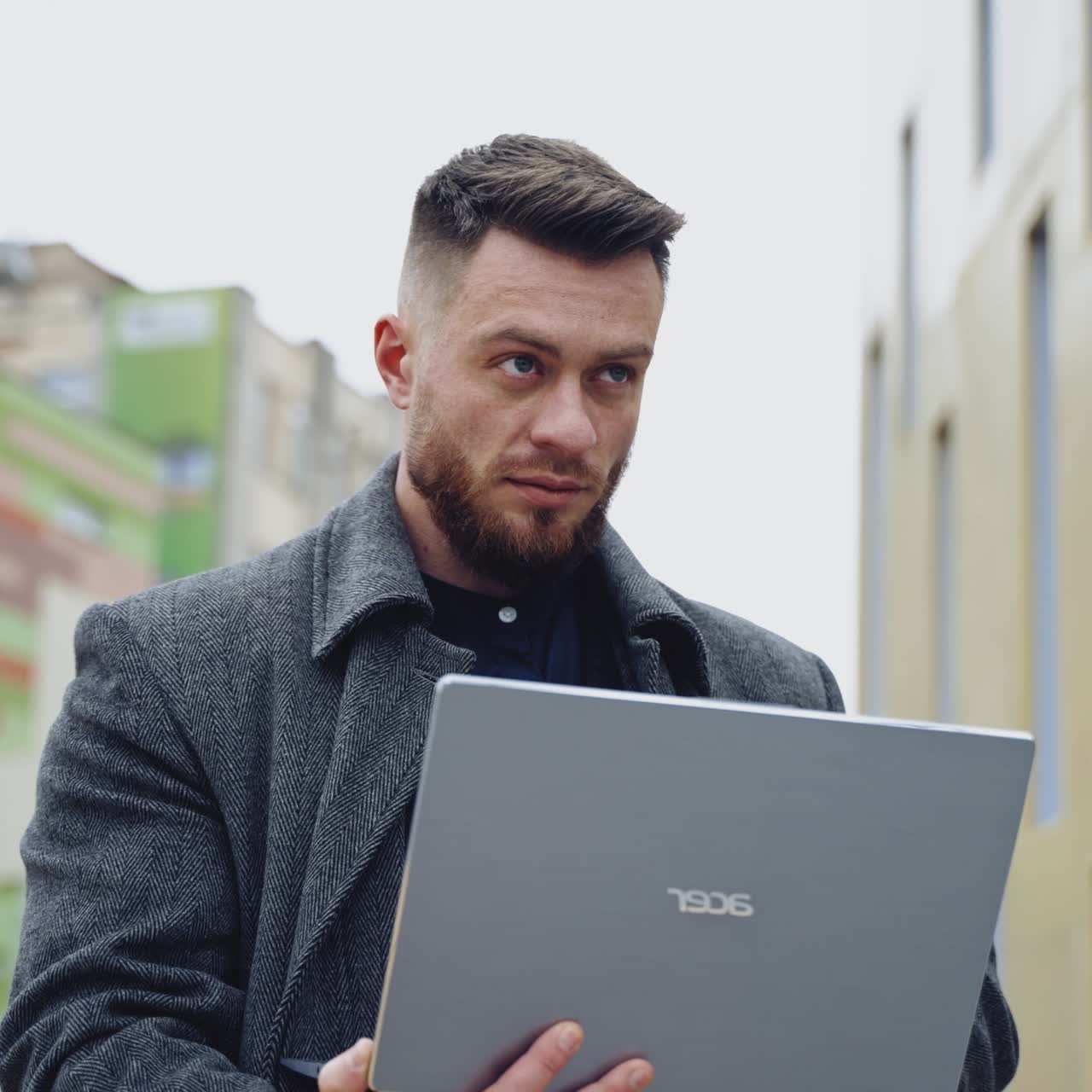 Young businessman with laptop