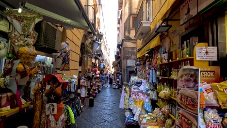 crowded market street with shops and tourists