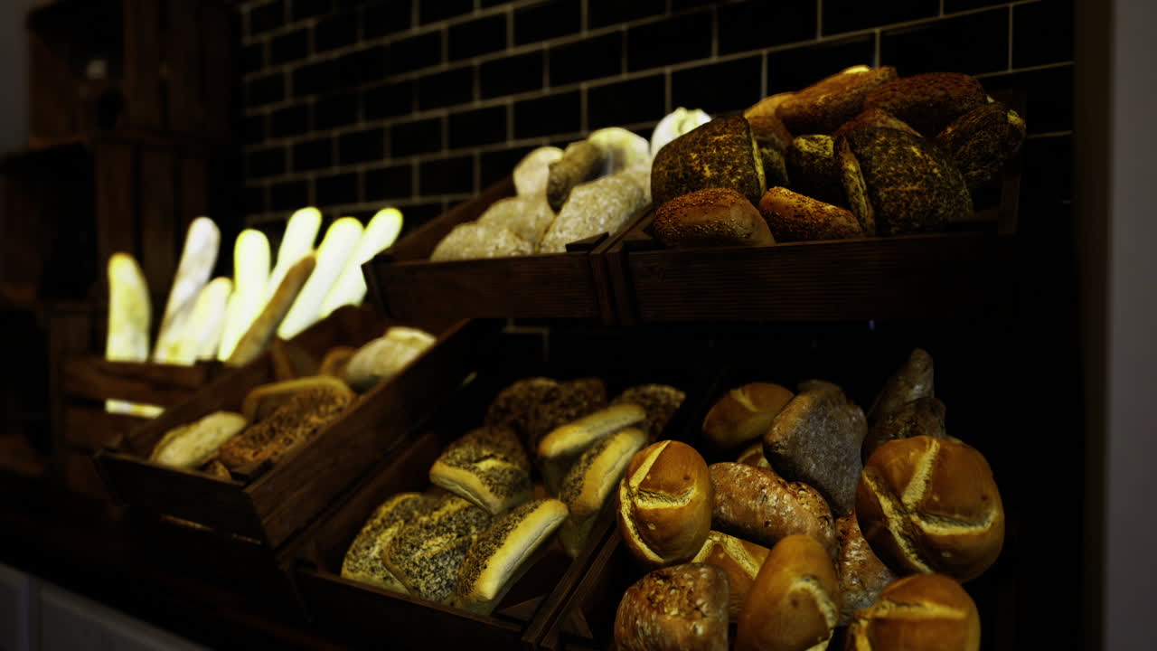 Breads displayed in wooden baskets at a bakery showcasing variety