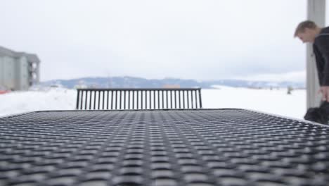 dog running and leaping off a bench