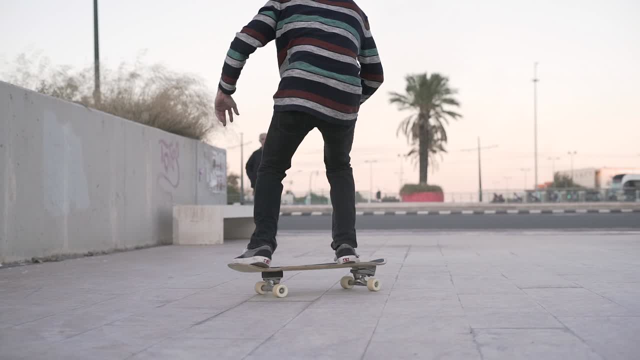 Skateboarder Performing Tricks
