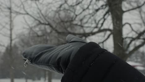 Closeup-of-Hand-in-Winter-Glove-Waiting-for-Snow