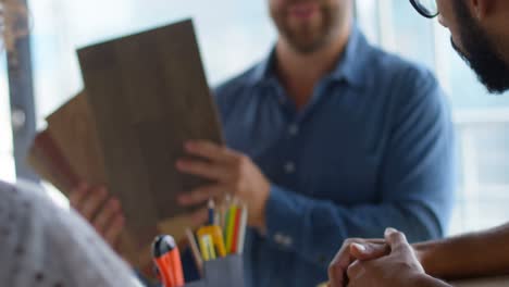 Business-colleagues-interacting-with-each-other-in-meeting-4k-