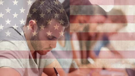 Animation-of-flag-of-america-over-smiling-students-writing-in-classroom