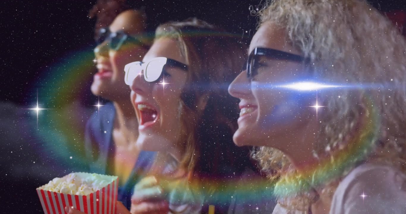 Espectadores de cine con gafas 3D comiendo palomitas, bebiendo de un vaso mientras una superposición cósmica se extiende, provocando alegría.