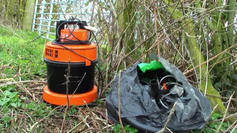 fly tipping in a countryside gateway in the uk