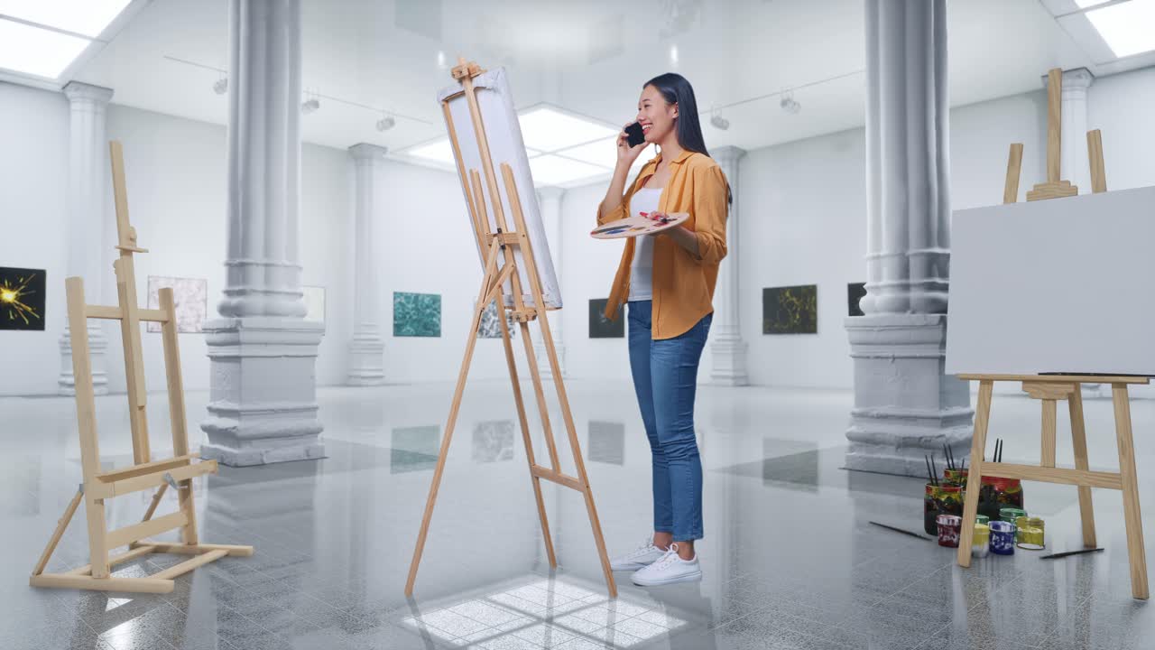 현대 미술관 에서 그림 을 그리는 동안 전화 로 이야기 하는 예술가