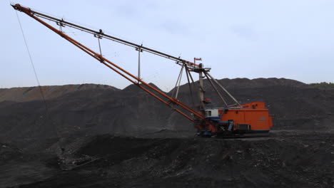 coal mining operation with excavator