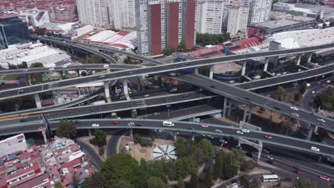 orbiting aerial view of a highway in mexico city