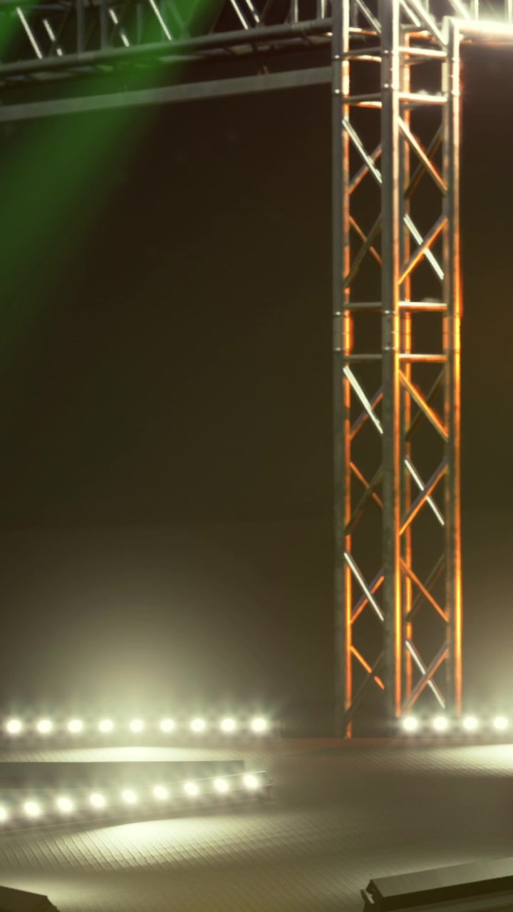 Light structure stands in a dark space for an event setup in a theater