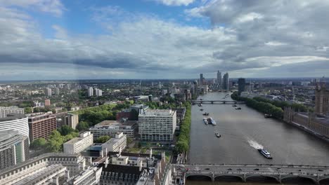 high aerial overlooking the city of london down the river thames