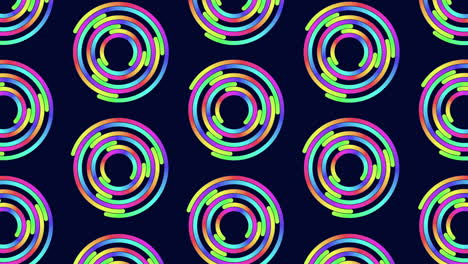 Neon-futuristic-rainbow-rings-pattern-on-black-space