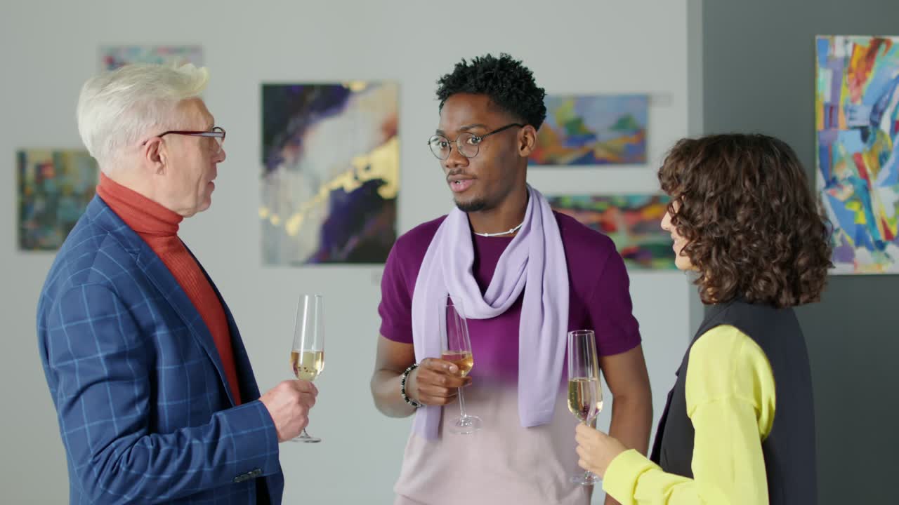 Art Gallery Visitors Chatting and Having Drinks