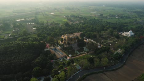 aerial drone capture of murshidabad, showcasing the majestic hazarduari palace and its surrounding gardens.