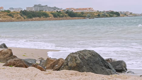 sea waves crashing against the rocks