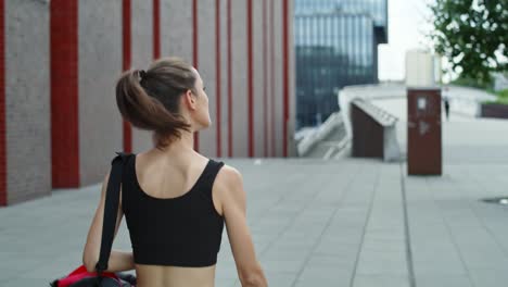 rear view video of woman going to training