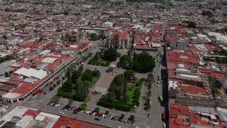 municipal ciudad guzman garden with central plaza in aerial shot, jalisco, mexico