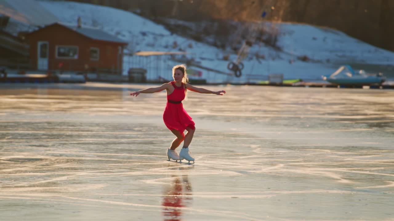 Woman ice skating on a frozen lake