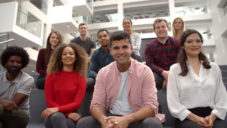 portrait of student group on steps of campus building