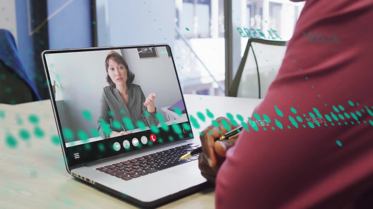 Animation of financial data processing over african american man on laptop video call