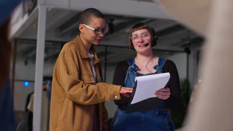 two women working together in an office