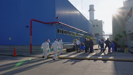 people at the end of a chemical emergency drill