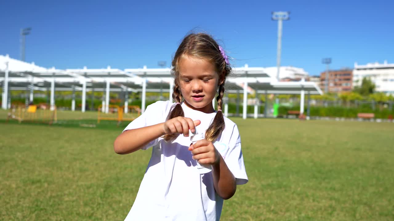 Girl Blowing Bubbles on a Sunny Day