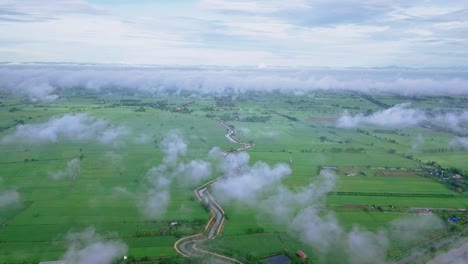 aerial view of cloudy sky high above the earth